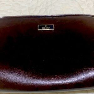 Gucci cosmetic case/clutch/crossbody bag.